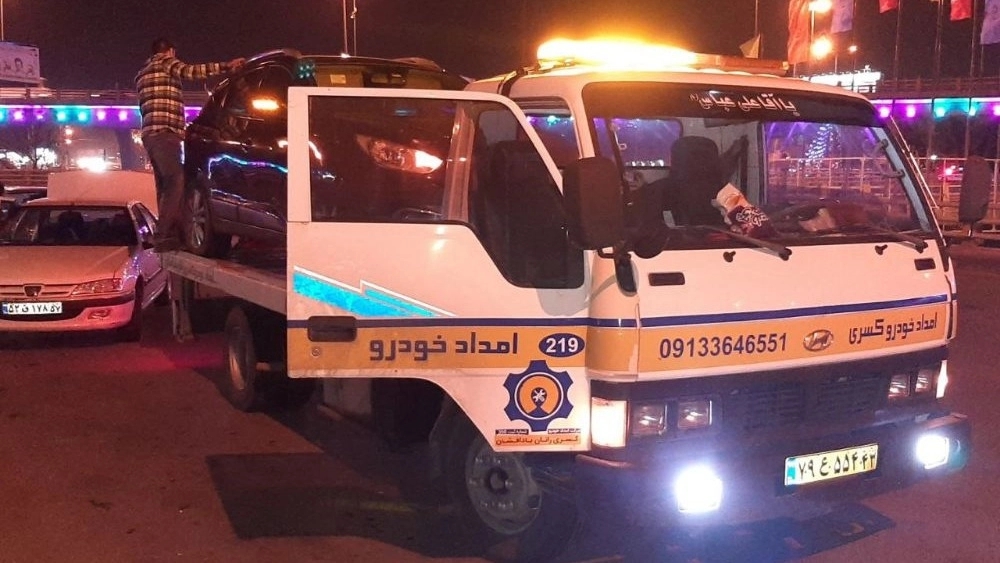 Charity, towel and mobile mechanics in Natanz